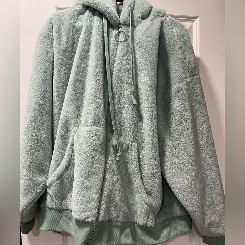 Teal fluffy oversized jacket.